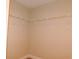 Spacious walk-in closet with wire shelving for optimal storage solutions at 14268 Se 27Th Ct, Summerfield, FL 34491