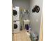 Laundry room with washer, dryer, utility sink and additional storage at 16052 Sw 15Th Ct, Ocala, FL 34473