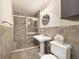 Bathroom with tiled shower, pedestal sink and toilet at 1728 Se 8Th St, Ocala, FL 34471