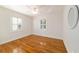 Bedroom with hardwood floors and plantation shutters at 1728 Se 8Th St, Ocala, FL 34471