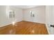 Bright bedroom with hardwood floors and plantation shutters at 1728 Se 8Th St, Ocala, FL 34471