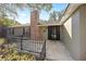 House exterior with brick chimney and covered porch at 1728 Se 8Th St, Ocala, FL 34471