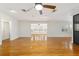 Living room with hardwood floors and built-in shelving at 1728 Se 8Th St, Ocala, FL 34471