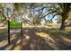 Entrance to Walker Park, featuring a sign and lush trees, providing a welcoming atmosphere at 1728 Se 8Th St, Ocala, FL 34471