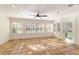 Sunroom featuring terracotta tile floors and plantation shutters at 1728 Se 8Th St, Ocala, FL 34471