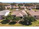 Aerial view of the house and surrounding neighborhood at 17370 Se 76Th Flintlock Ter, The Villages, FL 32162