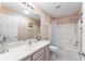 Bathroom with shower/tub combo, vanity, and toilet at 17370 Se 76Th Flintlock Ter, The Villages, FL 32162