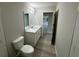 Clean bathroom with white vanity, quartz countertop and toilet at 1776 Sw 161St Pl, Ocala, FL 34473