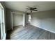 Spacious bedroom with wood-look floors and a large closet at 1776 Sw 161St Pl, Ocala, FL 34473