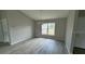 Bright dining room with wood-look floors and a chandelier at 1776 Sw 161St Pl, Ocala, FL 34473