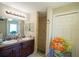 Bathroom with shower and double vanity at 201 Emerald Loop Pass, Ocala, FL 34472