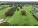 Wide aerial view of expansive property with trees and pasture at 20921 Sw 36Th St, Dunnellon, FL 34431