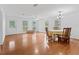 Bright dining room with hardwood floors and large windows at 20921 Sw 36Th St, Dunnellon, FL 34431