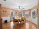 Bright dining room with table and chairs near kitchen at 20921 Sw 36Th St, Dunnellon, FL 34431