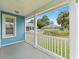 Inviting front porch overlooking the backyard at 20921 Sw 36Th St, Dunnellon, FL 34431