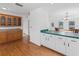 Kitchen with wood cabinets and green countertops at 20921 Sw 36Th St, Dunnellon, FL 34431