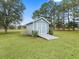 Large storage shed with double doors and a ramp at 20921 Sw 36Th St, Dunnellon, FL 34431