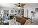 Casual dining area with rustic table and ceiling fan at 2575 Se 34Th St, Ocala, FL 34471