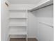 White closet with shelves and hanging rod at 3827 Ne 17Th Street Cir, Ocala, FL 34470