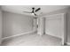 Bright bedroom with ceiling fan and closet at 4335 Sw 159Th Ave, Ocala, FL 34481