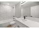 Clean bathroom with white vanity, marble shower, and bathtub at 4353 Sw 159Th Ave, Ocala, FL 34481