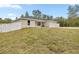 New construction home with a white vinyl fence and grassy yard at 4353 Sw 159Th Ave, Ocala, FL 34481