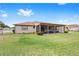 Backyard with screened porch and shed at 4535 Nw 34Th Pl, Ocala, FL 34482