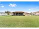 Large backyard with home and shed view at 4535 Nw 34Th Pl, Ocala, FL 34482