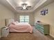 Spacious bedroom with plush carpeting and ample natural light at 4730 Se 31St St, Ocala, FL 34480