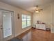 Breakfast nook with hardwood floors, window seat, and built in cabinetry at 4730 Se 31St St, Ocala, FL 34480