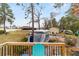 View from deck of backyard, covered pool, and shed at 4933 Sw 109Th Loop, Ocala, FL 34476