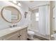 Bathroom with a bathtub, shower, and rustic vanity at 4933 Sw 109Th Loop, Ocala, FL 34476