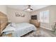 Bedroom with a queen-size bed and neutral decor at 4933 Sw 109Th Loop, Ocala, FL 34476