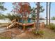 Wooden deck with steps leading to above ground pool at 4933 Sw 109Th Loop, Ocala, FL 34476