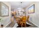 Rustic wooden dining set in a sunlit dining area at 4933 Sw 109Th Loop, Ocala, FL 34476