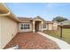 House exterior showcasing walkway and stone accents at 4933 Sw 109Th Loop, Ocala, FL 34476