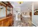 Home bar area featuring an antique bar cabinet and a view into the living room at 4933 Sw 109Th Loop, Ocala, FL 34476