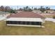 Rear view of house showing sunroom addition at 4933 Sw 109Th Loop, Ocala, FL 34476