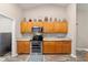 Kitchen features stainless steel appliances and wood cabinets at 4933 Sw 109Th Loop, Ocala, FL 34476