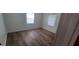 Bright bedroom with new flooring and neutral walls at 5235 Se 107Th St, Belleview, FL 34420