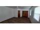 Spacious bedroom with new flooring and neutral walls at 5235 Se 107Th St, Belleview, FL 34420