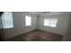 Simple bedroom with new flooring and ample natural light at 5235 Se 107Th St, Belleview, FL 34420