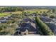 Aerial view of community, showcasing home's proximity to golf course at 6751 Sw 91St Cir, Ocala, FL 34481