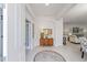 Bright and spacious entryway with wood console table at 6751 Sw 91St Cir, Ocala, FL 34481