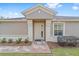 Front door entrance with stone walkway at 6751 Sw 91St Cir, Ocala, FL 34481