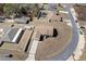 Aerial view of a single-Gathering home with a large yard and driveway at 7000 Sw 129Th Pl, Ocala, FL 34473