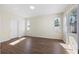 Bright bedroom with wood-look floors and large windows at 7000 Sw 129Th Pl, Ocala, FL 34473