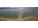 Scenic view of lake with sun reflecting on the water at 9836 Sw 75Th Street Rd, Ocala, FL 34481