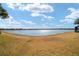 Gorgeous full lake view with community homes in the distance at 9836 Sw 75Th Street Rd, Ocala, FL 34481