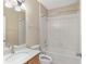 Clean bathroom with a tub, shower, and updated vanity at 10384 Sw 41St Ave, Ocala, FL 34476